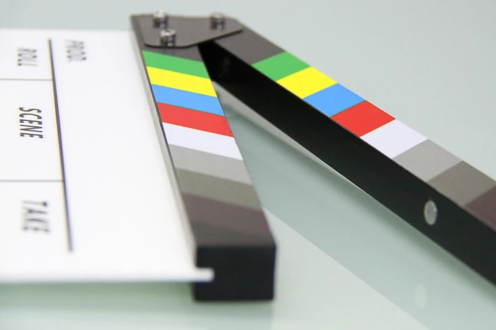 A close up of the film slate on top of a table